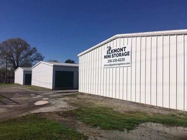 Side of storage facility with Elkmont Mini Storage Sign